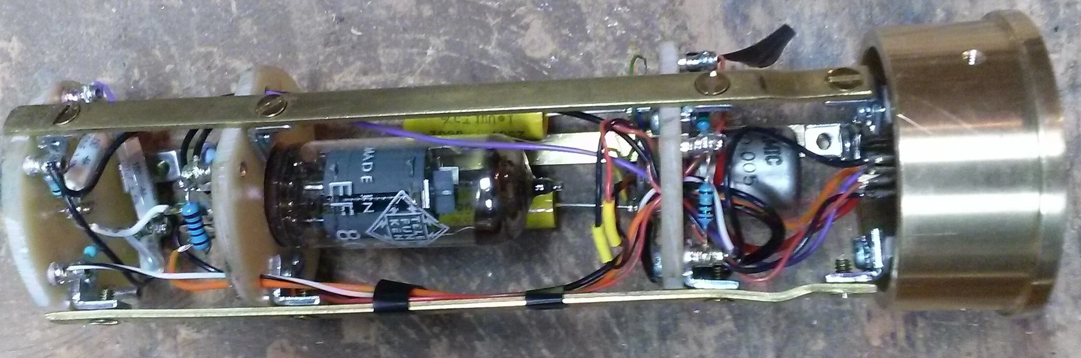 Built using turret boards, with a EF800 Telefunken tube, an AMI T47 transformer, and a Thiersch PVC cente terminated capsule. The power supply housing is from collective cases, and the power supply design is from danny (at groupdiy), which uses a ch