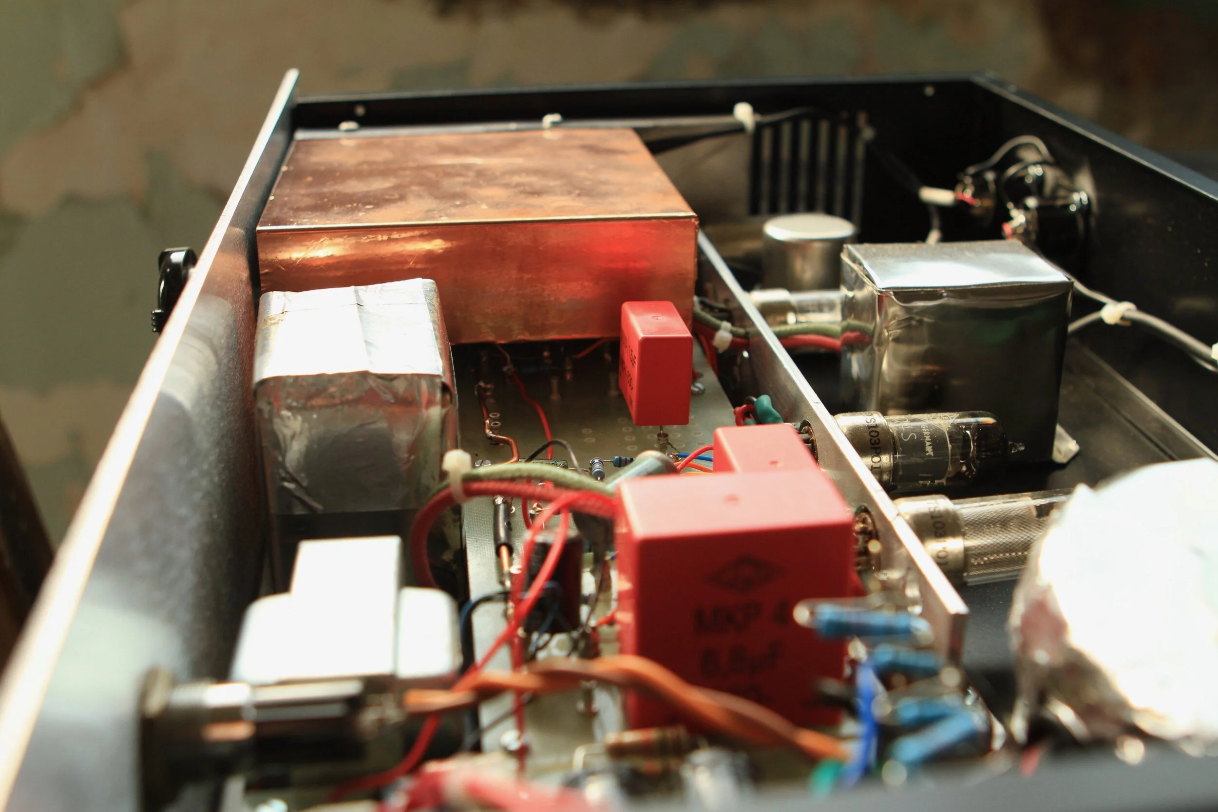  Using Jensen transformers for the input and output: a JT-115k-E90 transformer on the input and JT-10k61-1M on the output. The ?E90? designation means the Jensen has 90 dB of shielding.   